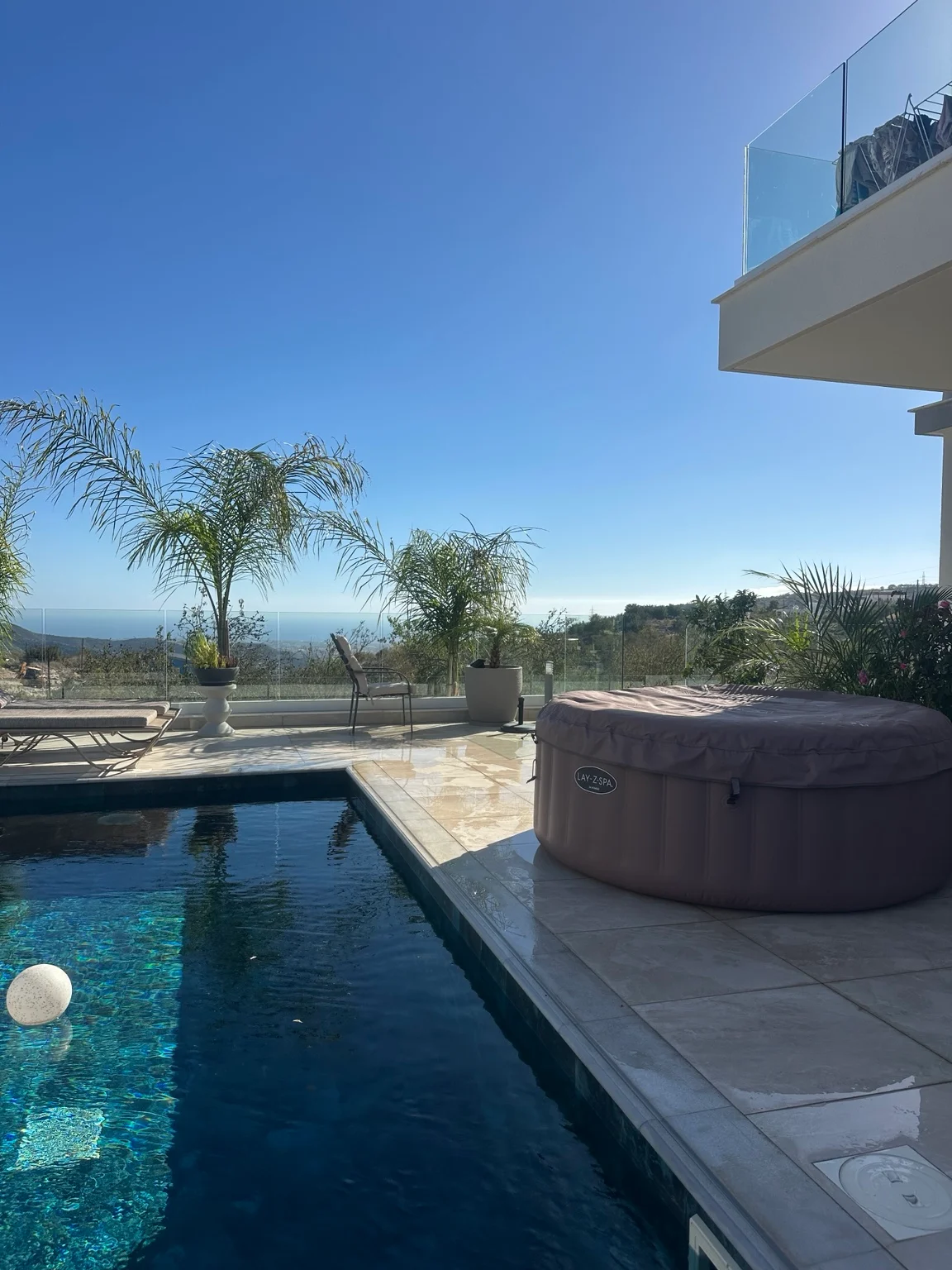 Lay-Z-Spa Hawaii hot tub beside a private Cyprus villa pool with sea views